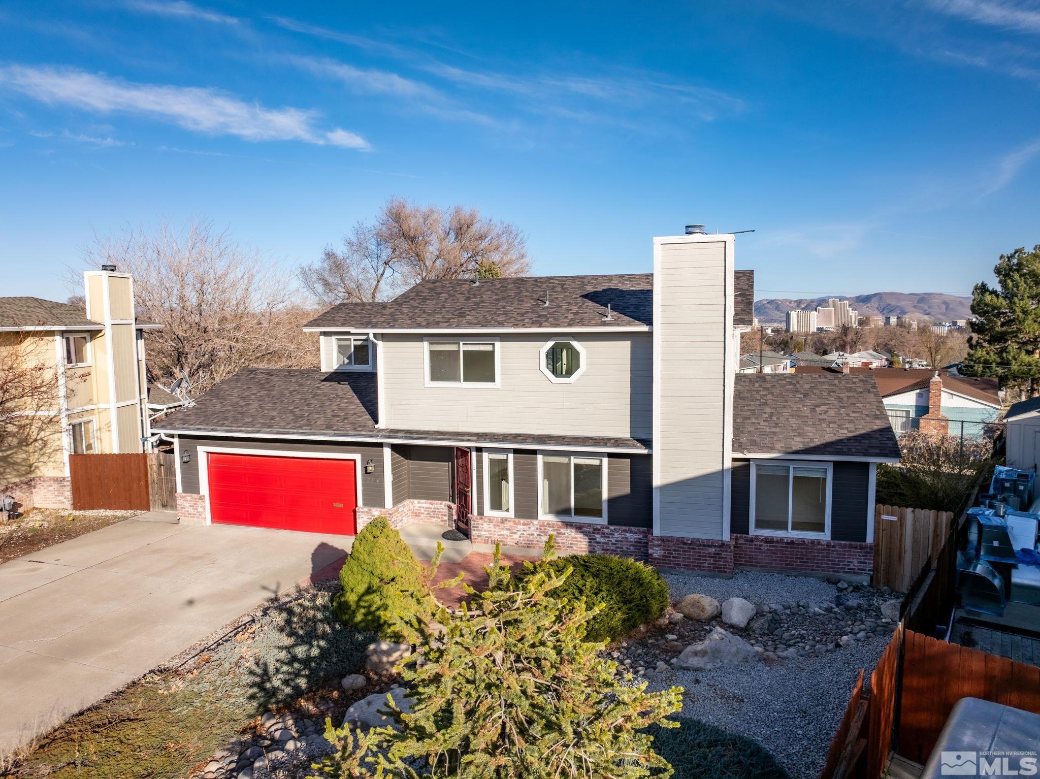 2170 Cobblestone Court Reno, NV 89503 - Photo 3 of 40 a view of a big yard in front of a house