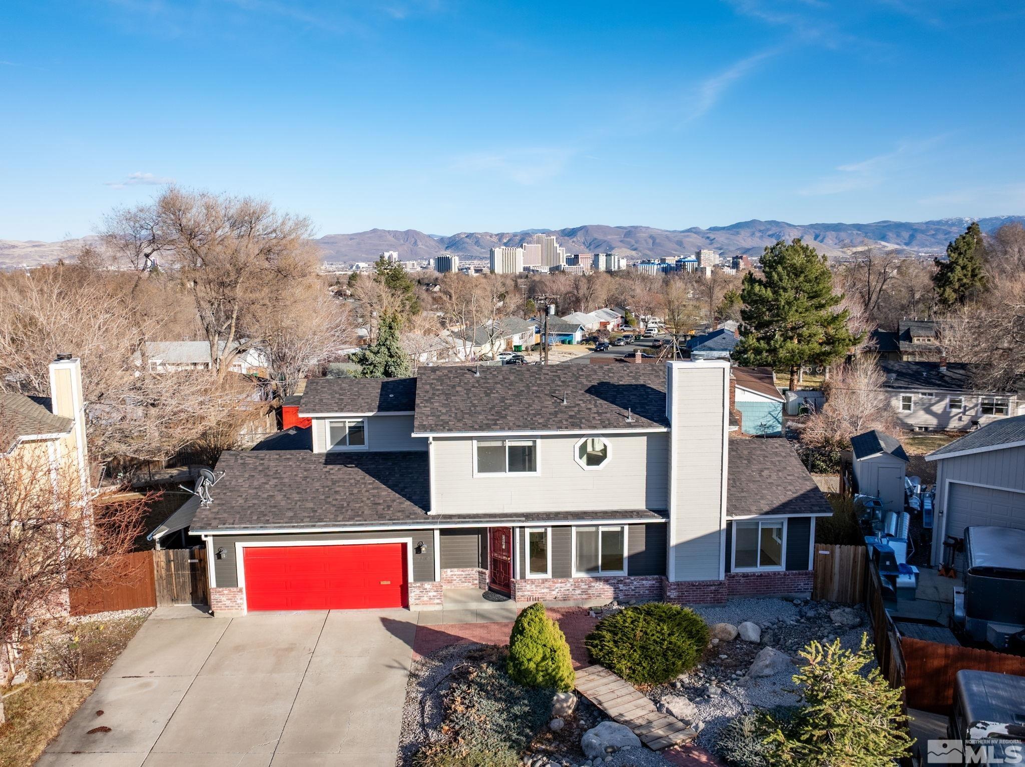 2170 Cobblestone Court Reno, NV 89503 - Photo 6 of 40 an aerial view of residential houses with outdoor space and trees