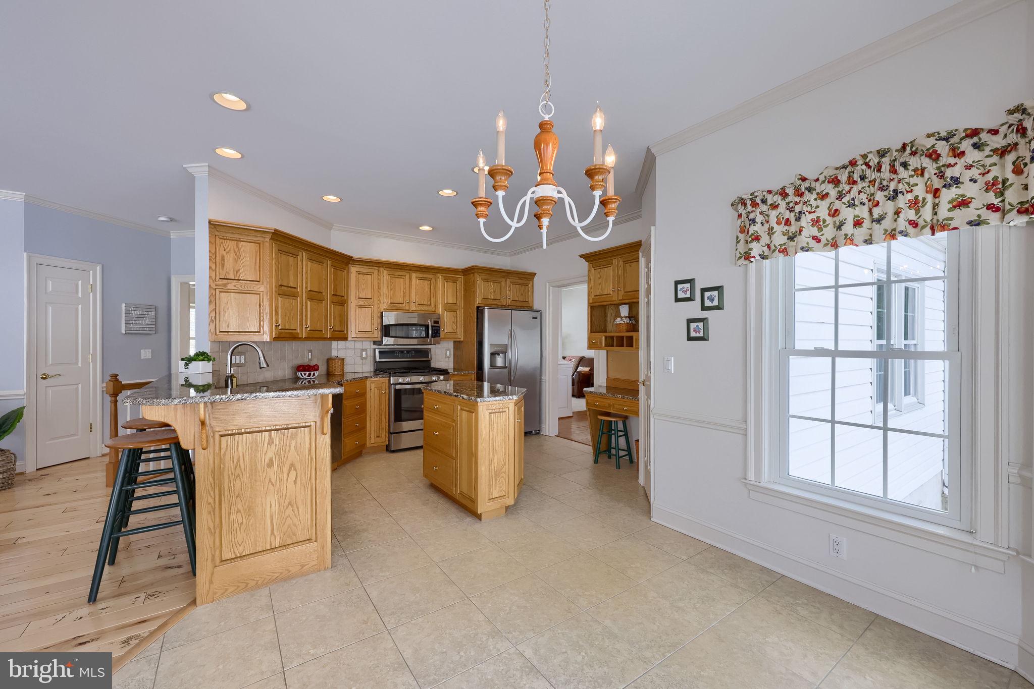 168 Olde Field Drive Lititz, PA 17543 - Photo 12 of 74 a kitchen that has a lot of white cabinets and stainless steel appliances