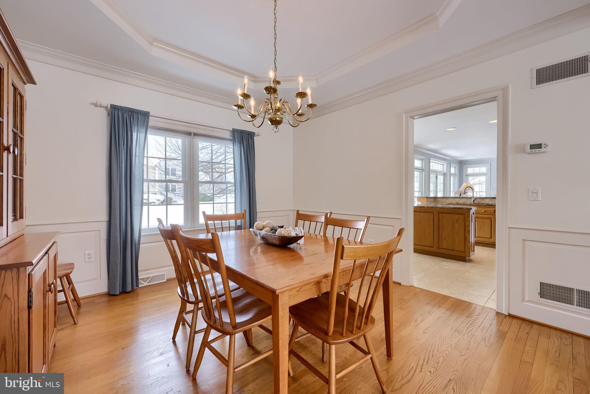 168 Olde Field Drive Lititz, PA 17543 - Photo 21 of 74 a view of a dining room with furniture window and wooden floor