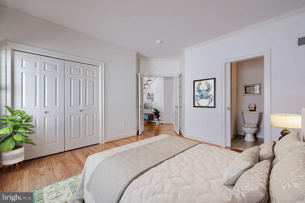 168 Olde Field Drive Lititz, PA 17543 - Photo 37 of 74 a bedroom with a bed and a potted plant