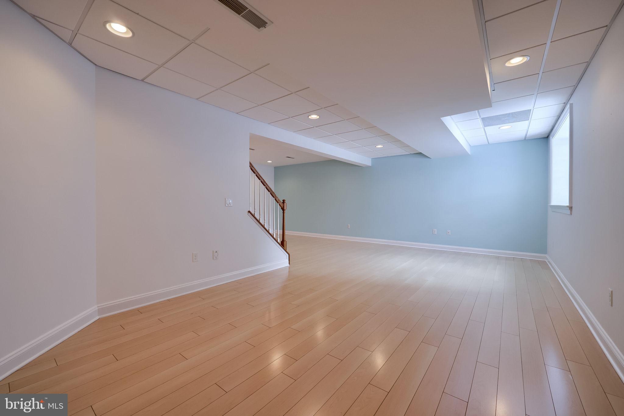 168 Olde Field Drive Lititz, PA 17543 - Photo 53 of 74 an empty room with wooden floor and windows