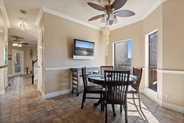 a view of a dining room with furniture