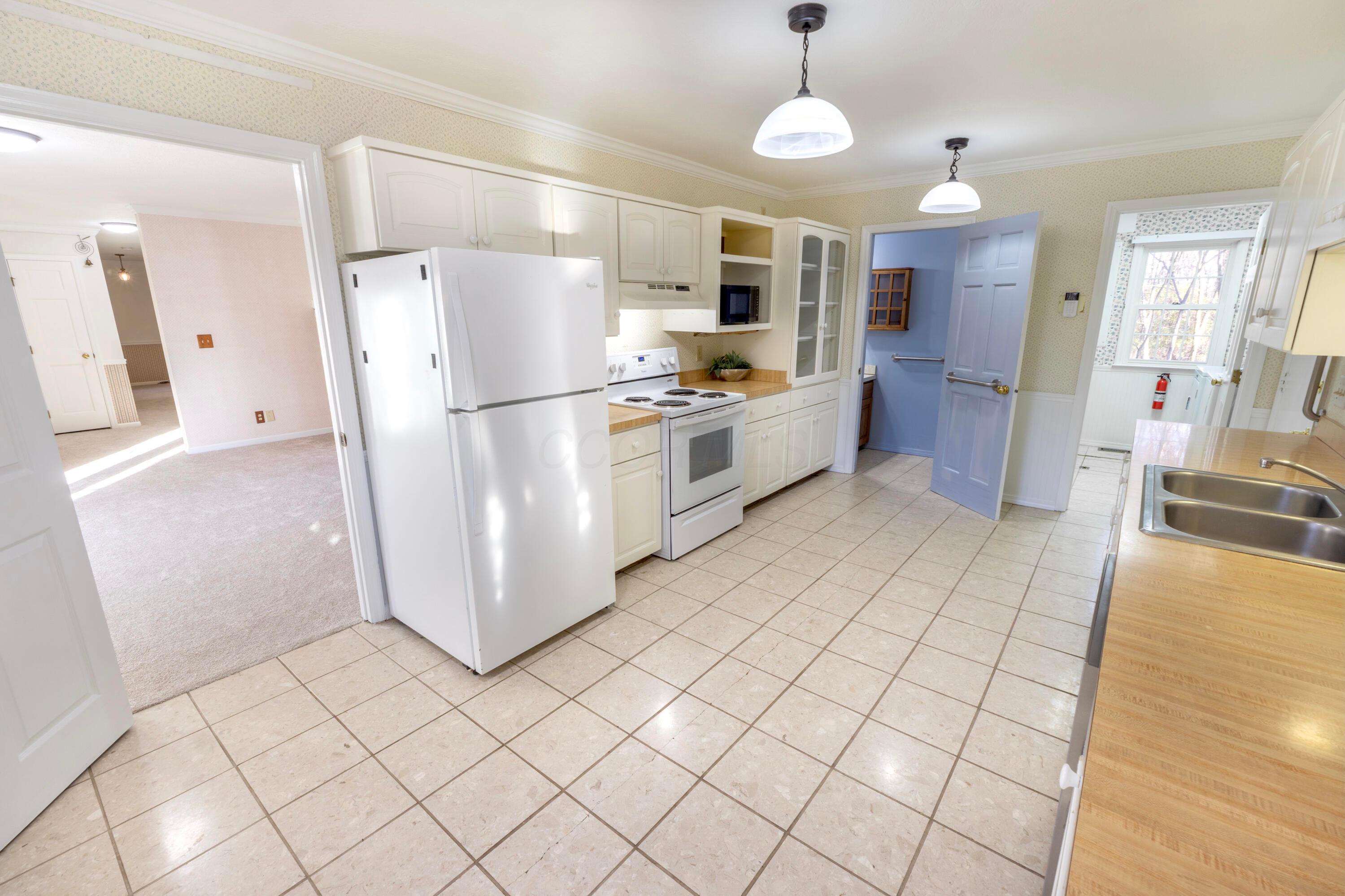 3880 Fry Road Ostrander, OH 43061 - Photo 21 of 82 Half bath off the kitchen.