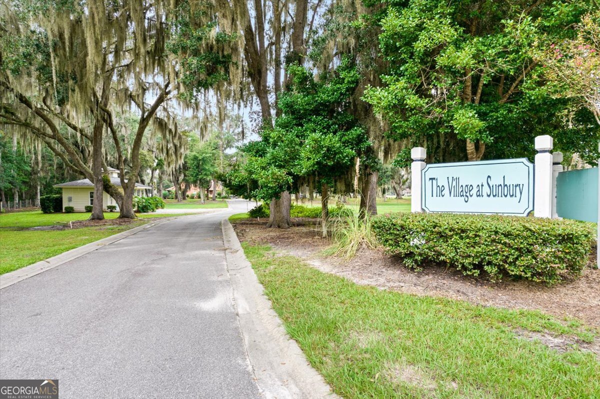 4787 Sunbury Road Midway, GA 31320 - Photo 50 of 72 a sign on the side of a building
