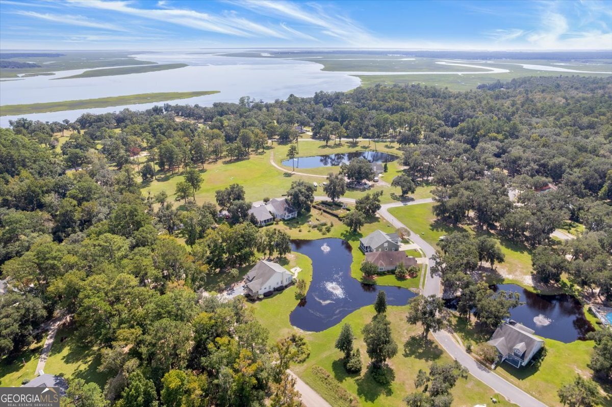 4787 Sunbury Road Midway, GA 31320 - Photo 70 of 72 a view of a city with lots of residential buildings ocean and mountain view in back