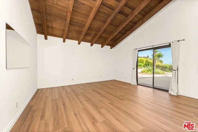 a bathroom with a tub and shower
