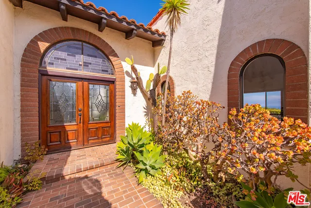 a view of a swimming pool with a lake view