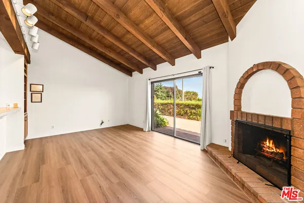 a view of a living room with a balcony
