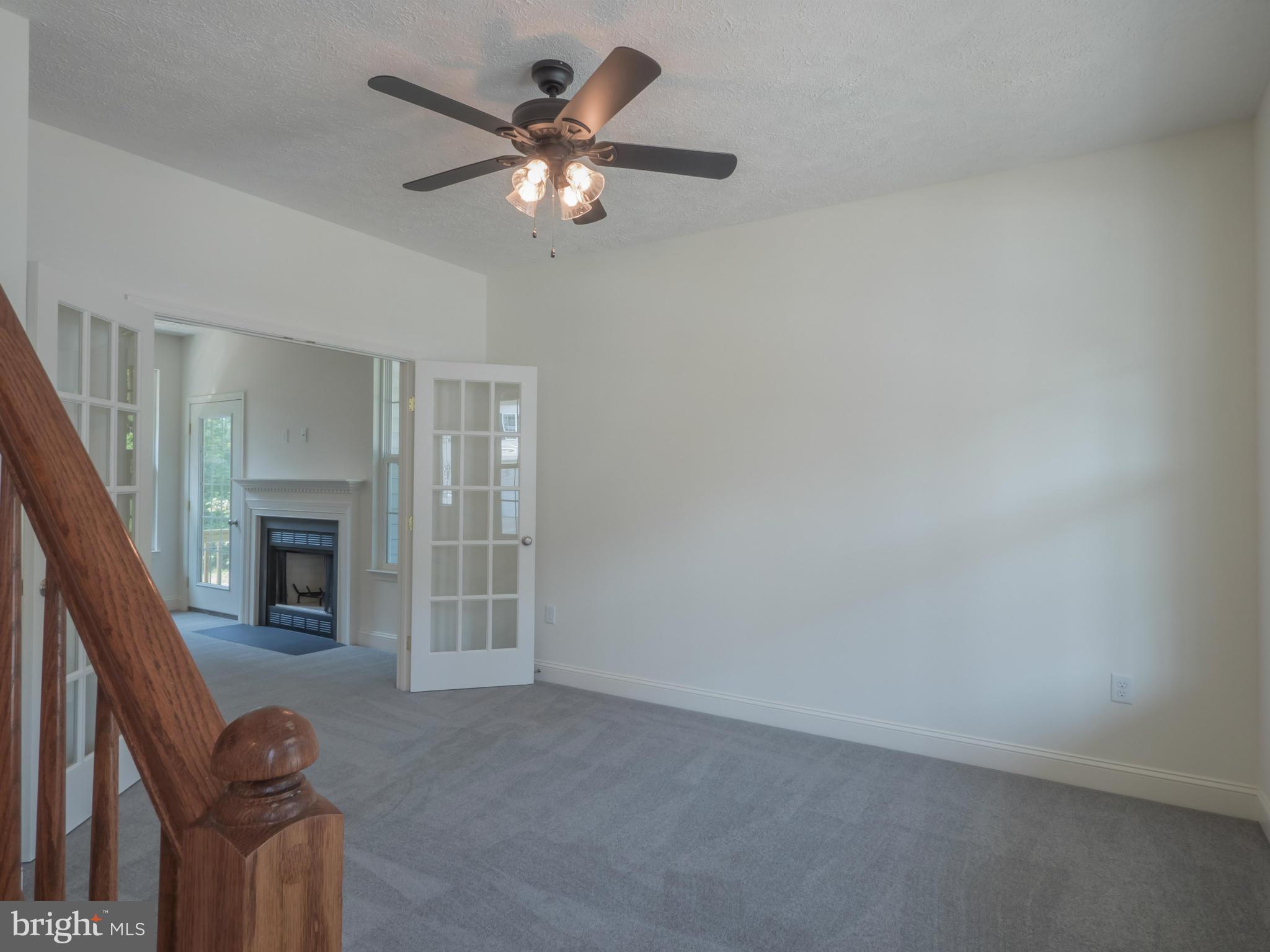 94 Bean Road Dowell, MD 20688 - Photo 3 of 16 a view of a livingroom with a fireplace