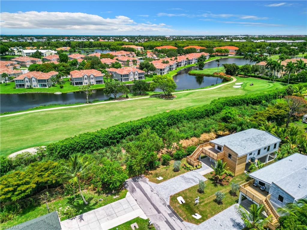 2505 Storter Avenue Naples, FL 34112 - Photo 2 of 49 an aerial view of multiple house