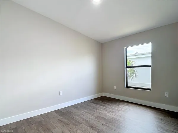 an empty room with a window