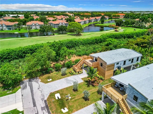 an aerial view of a house with a garden