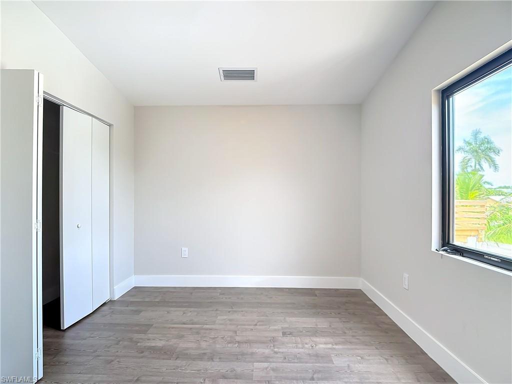 2505 Storter Avenue Naples, FL 34112 - Photo 31 of 49 a view of an empty room with a window