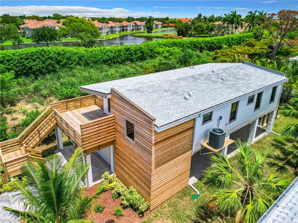 2505 Storter Avenue Naples, FL 34112 - Photo 41 of 49 an aerial view of a house with a yard
