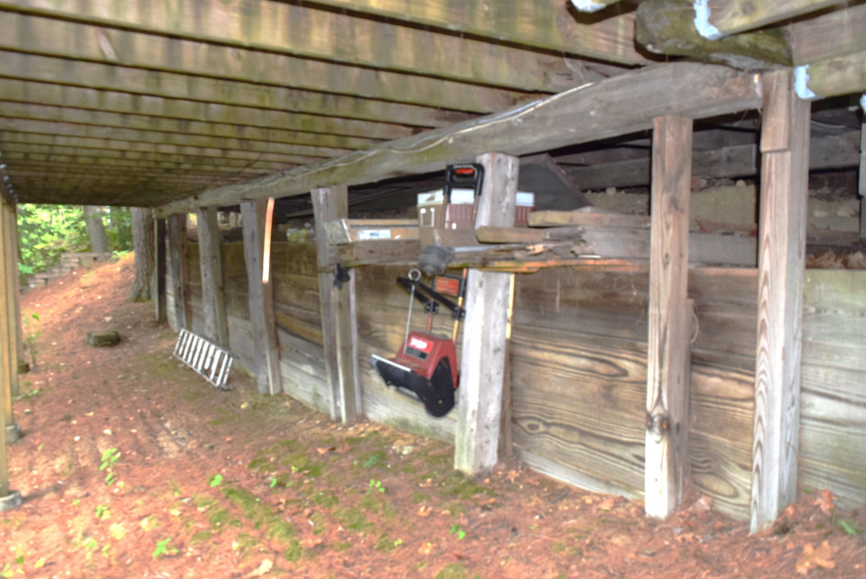 55 Sandy Bottom Road Turner, ME 04282 - Photo 11 of 35 Under deck storage