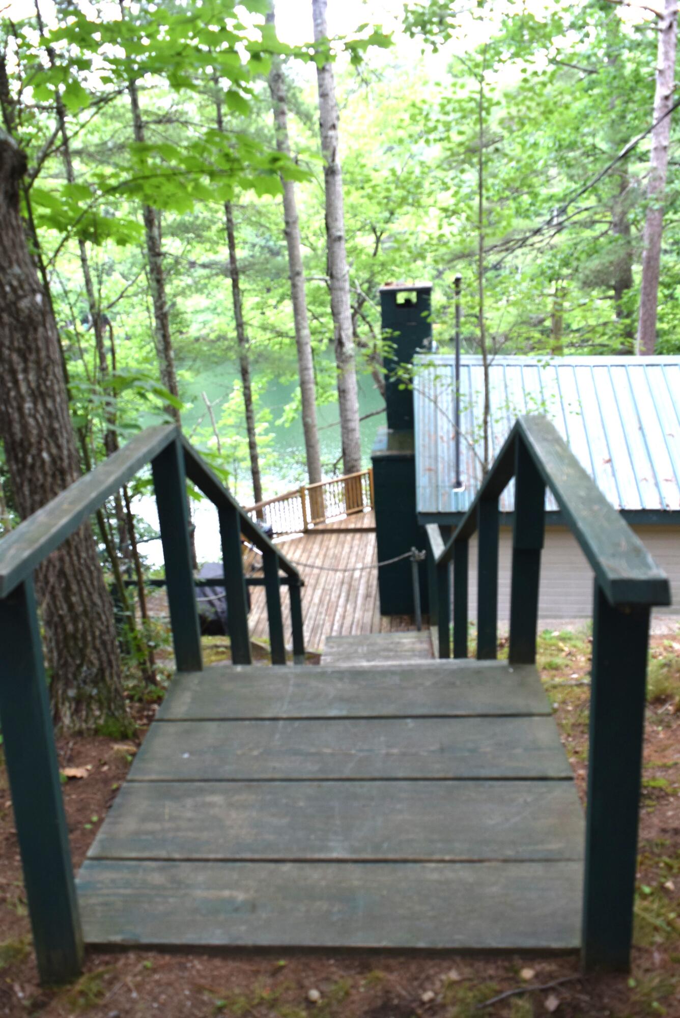 55 Sandy Bottom Road Turner, ME 04282 - Photo 6 of 35 stairway to cottage