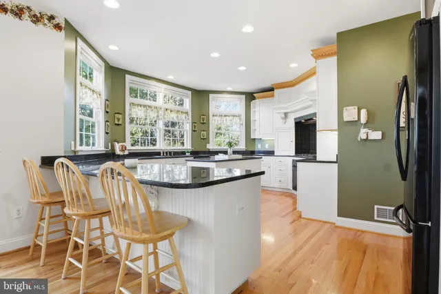 a bedroom with a bed and a television