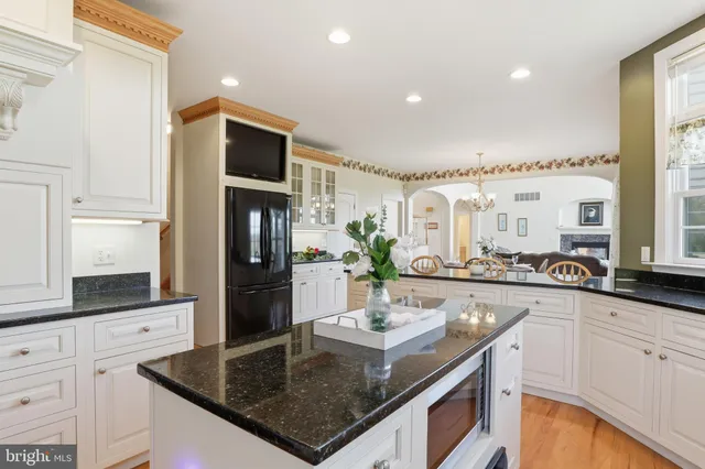a bed room with a bed and a potted plant