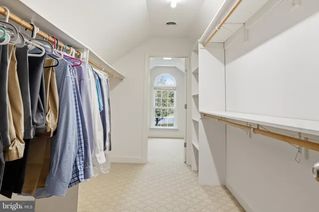 an aerial view of house with yard swimming pool and outdoor seating