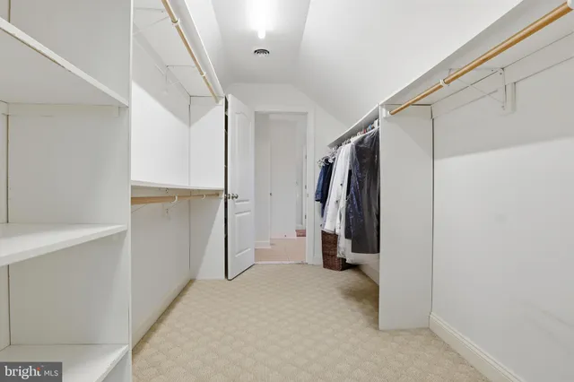 a view of swimming pool with a lake view