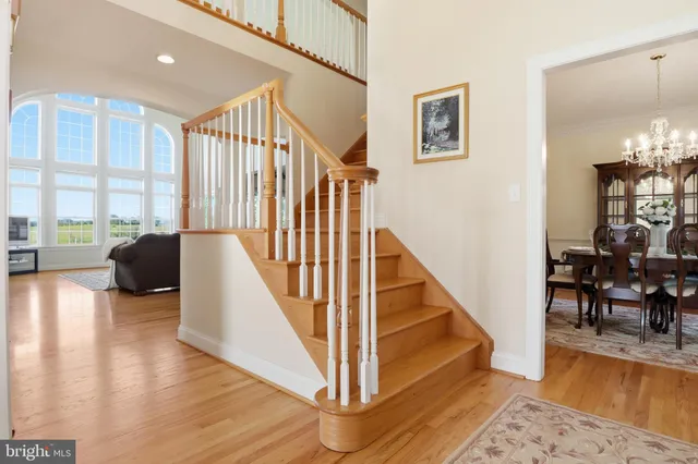 a kitchen with stainless steel appliances a refrigerator and cabinets