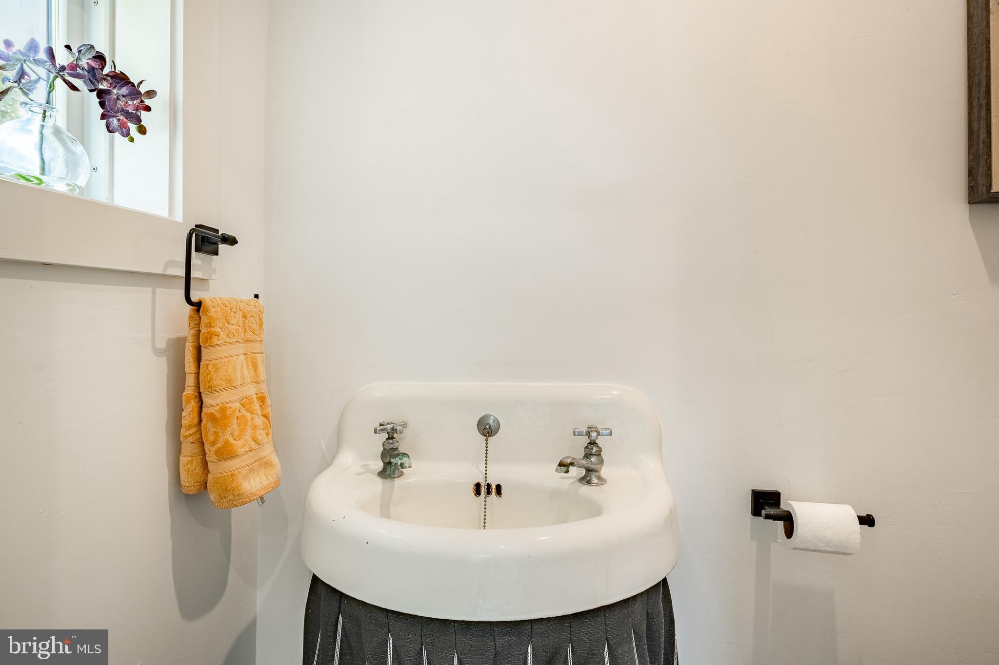 101 Grandview Road Ardmore, PA 19003 - Photo 29 of 55 a bathroom with a sink and a mirror