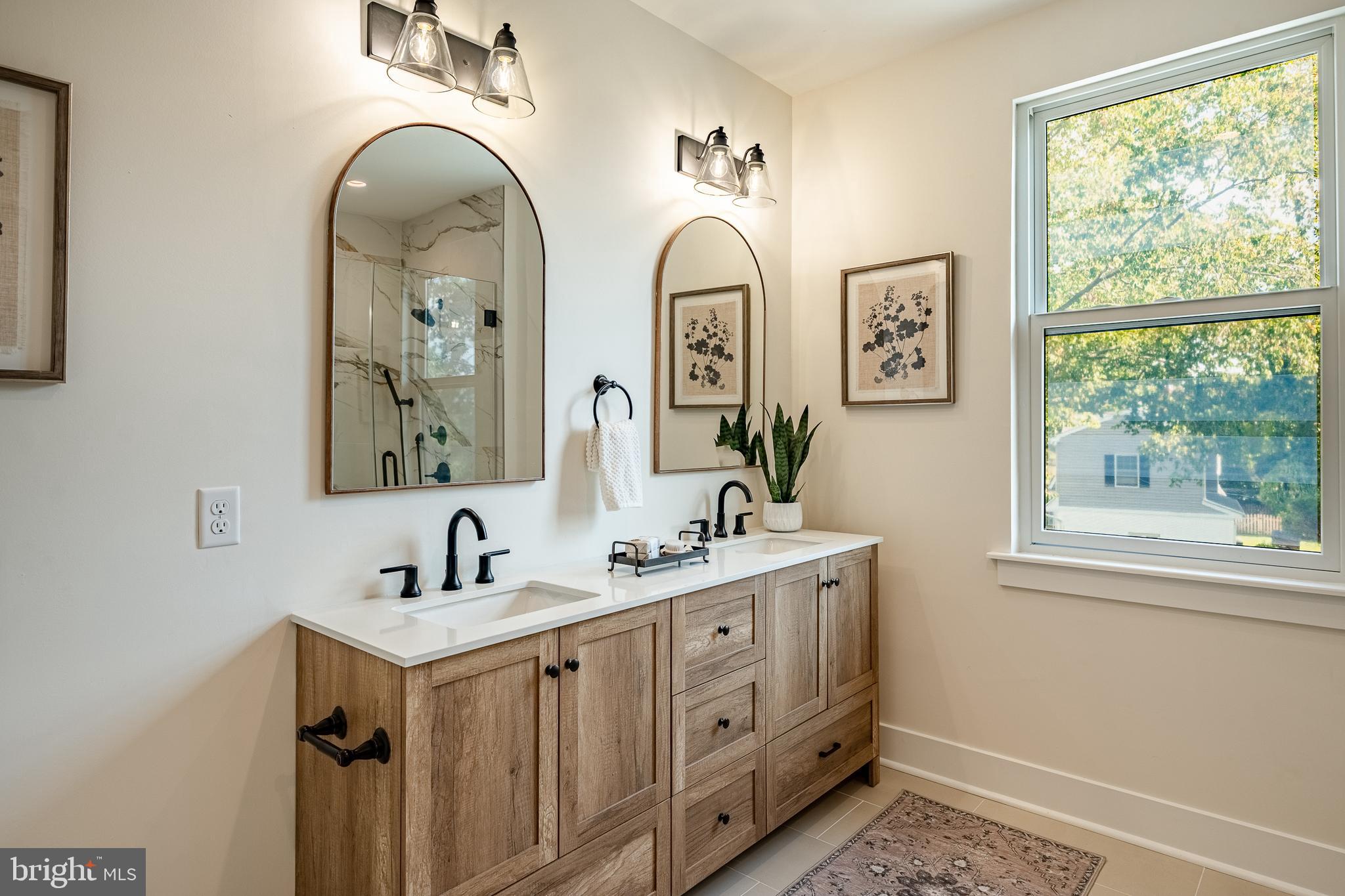 101 Grandview Road Ardmore, PA 19003 - Photo 38 of 55 a bathroom with 2 sink and a mirror