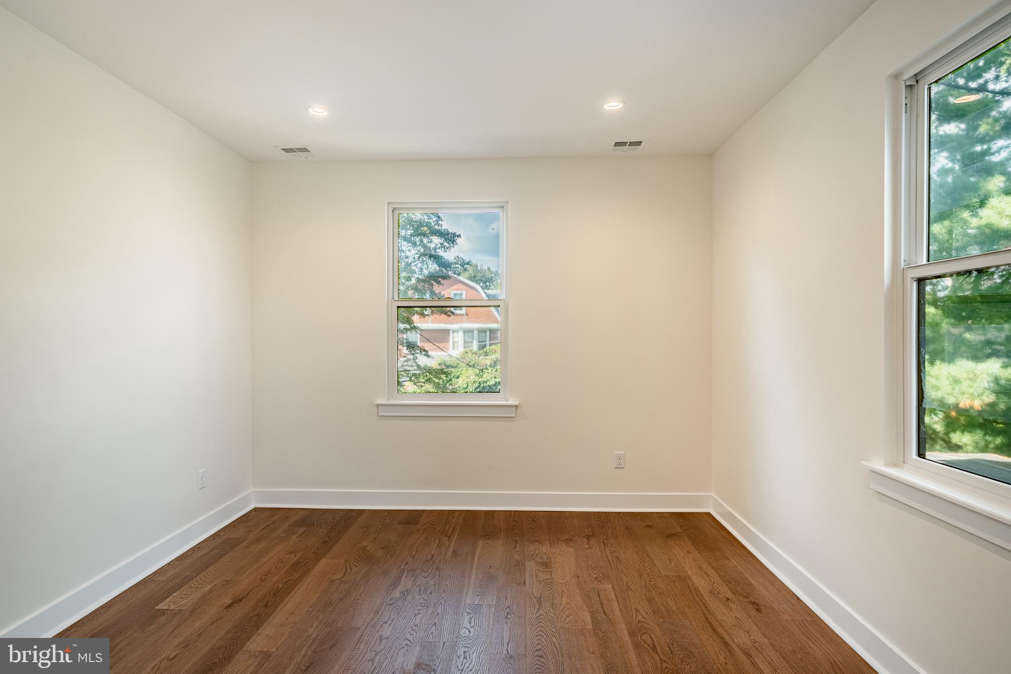 101 Grandview Road Ardmore, PA 19003 - Photo 41 of 55 an empty room with wooden floor and window
