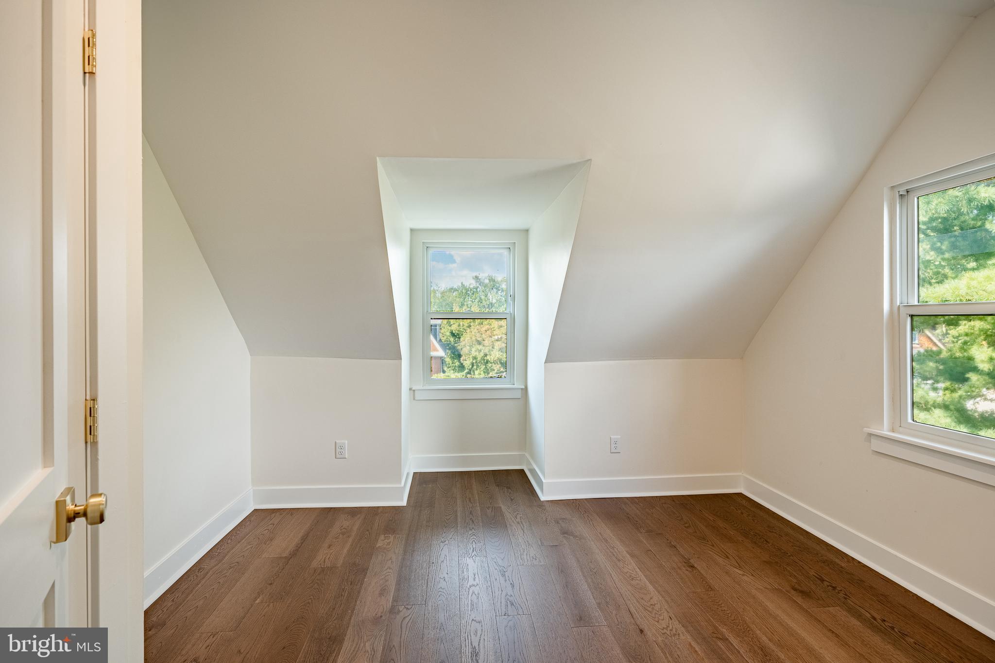 101 Grandview Road Ardmore, PA 19003 - Photo 44 of 55 an empty room with wooden floor and windows