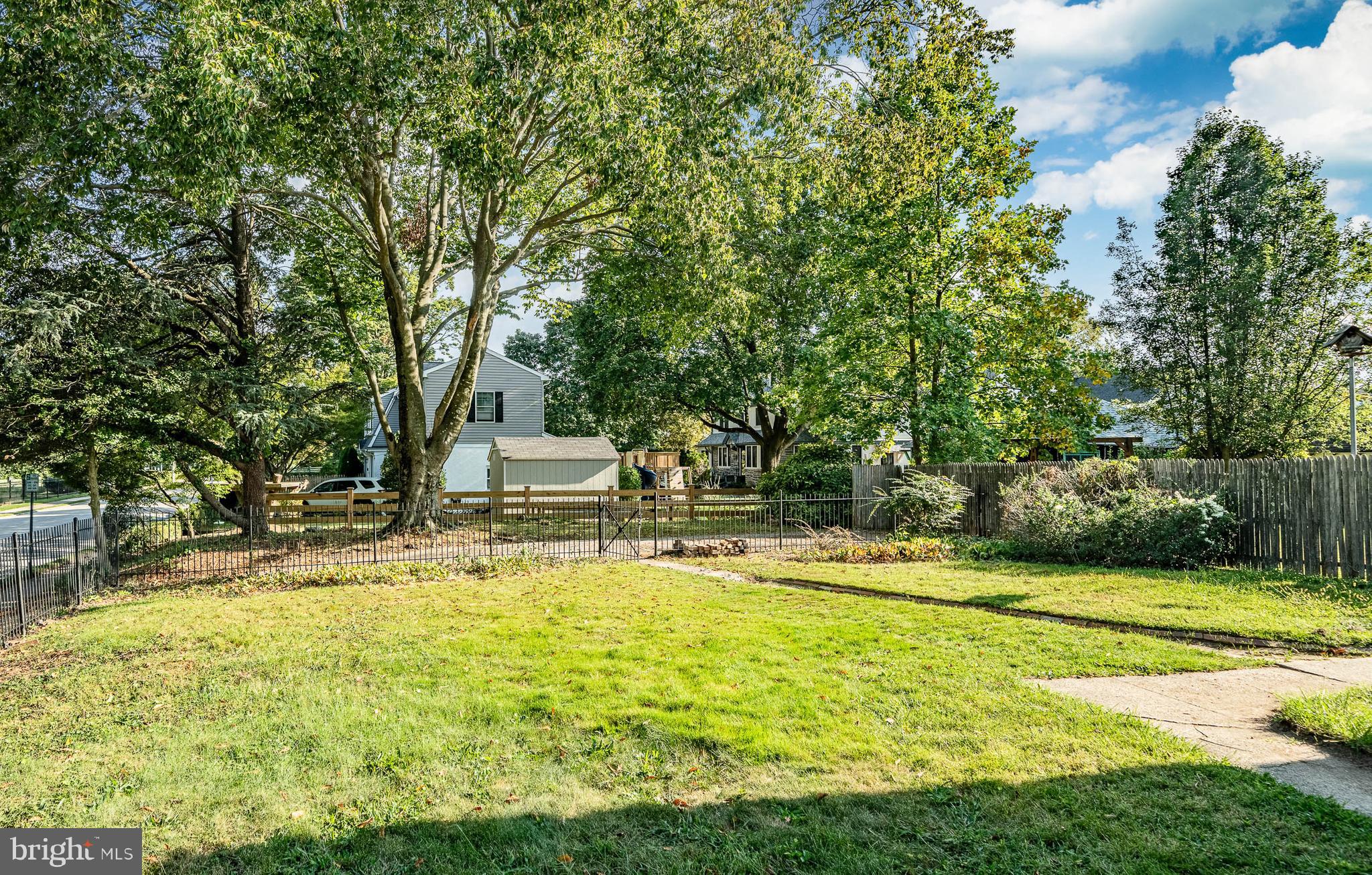 101 Grandview Road Ardmore, PA 19003 - Photo 51 of 55 a swimming pool with trees in the background