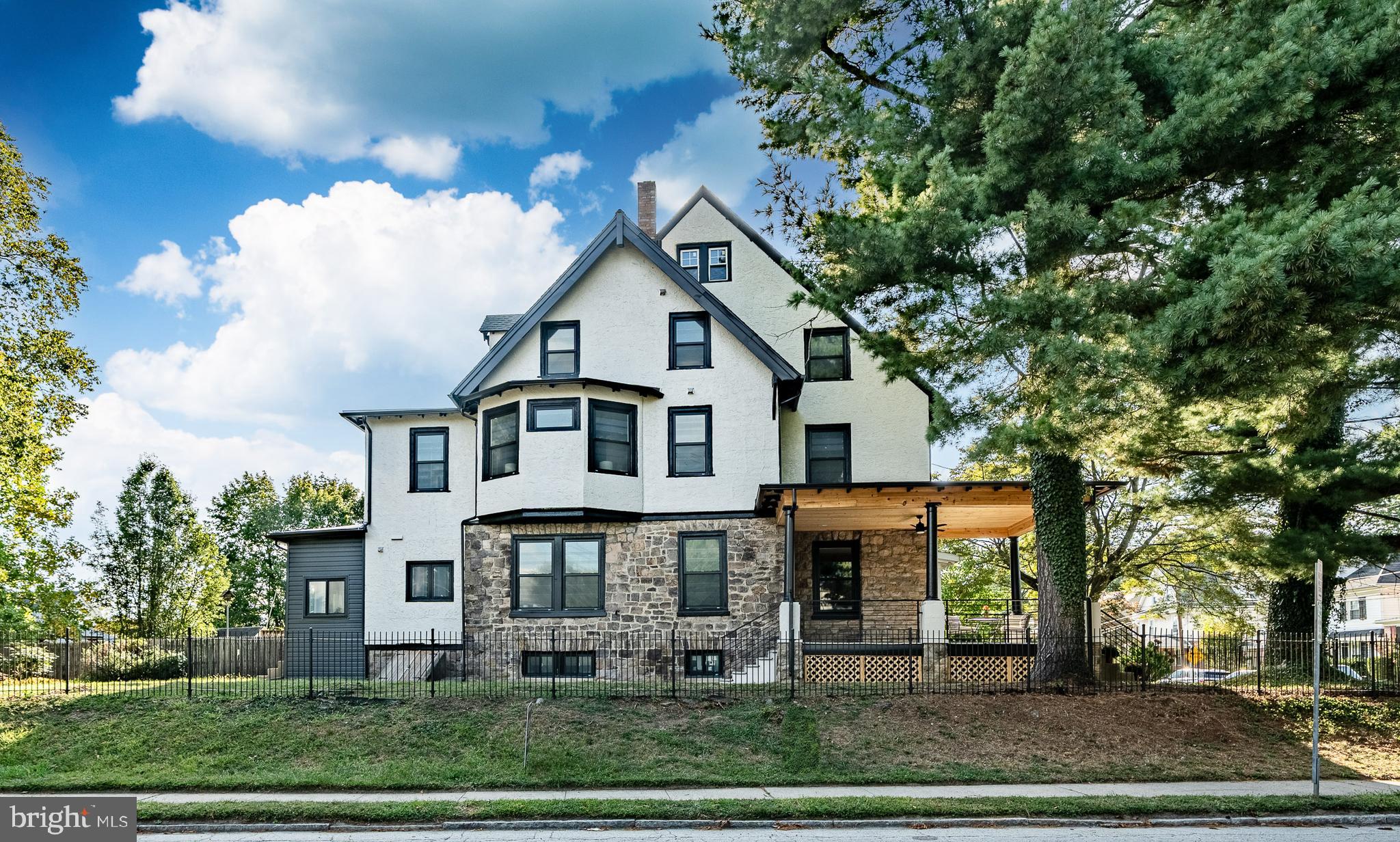 101 Grandview Road Ardmore, PA 19003 - Photo 54 of 55 a front view of a house with a yard