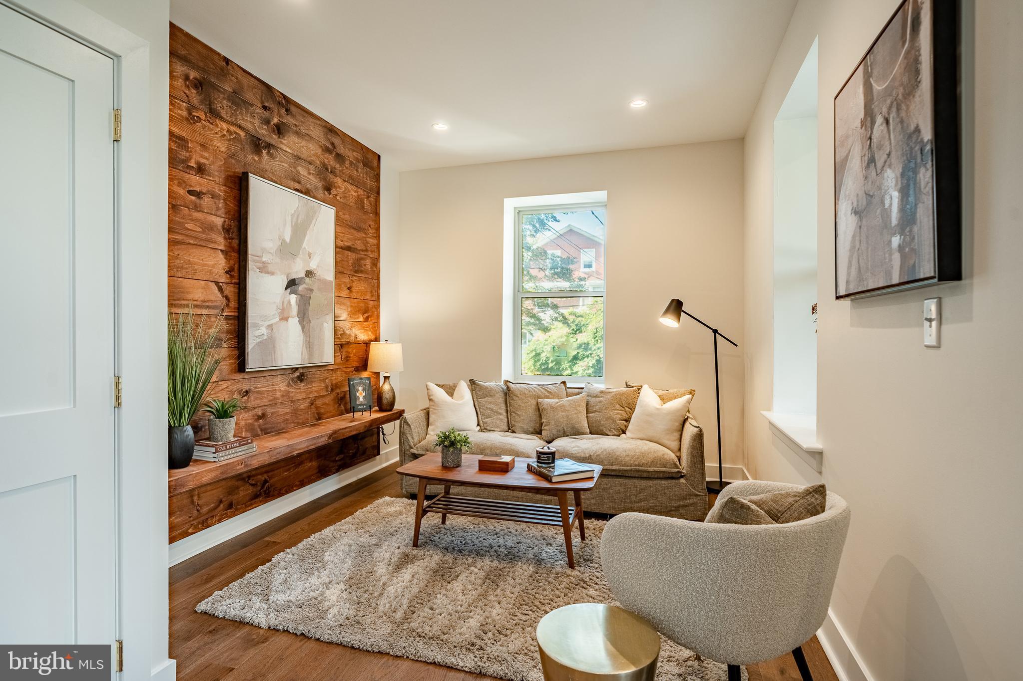 101 Grandview Road Ardmore, PA 19003 - Photo 8 of 55 a living room with furniture and a large window