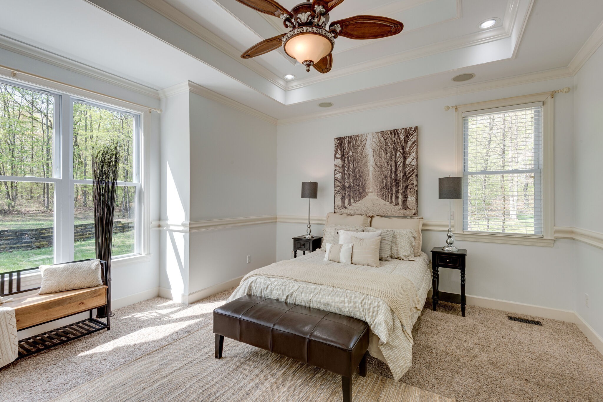 1288 2 Mile Road Burns, TN 37029 - Photo 24 of 70 a bedroom with a large bed and a chandelier