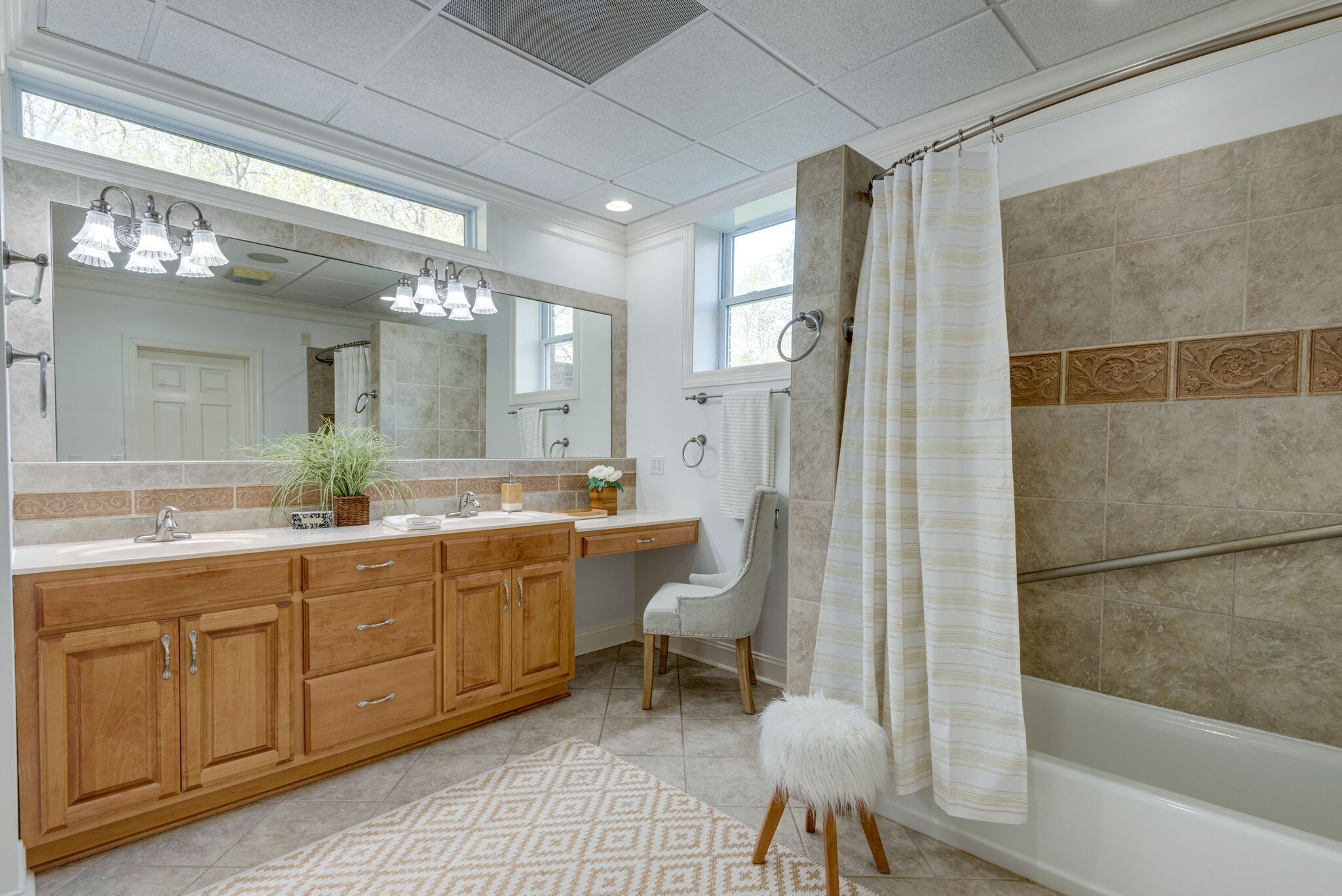 1288 2 Mile Road Burns, TN 37029 - Photo 45 of 70 a spacious bathroom with a granite countertop sink a toilet and a mirror