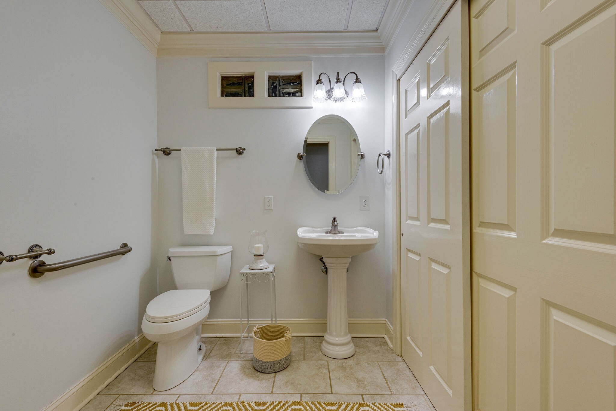 1288 2 Mile Road Burns, TN 37029 - Photo 47 of 70 a bathroom with a toilet sink and mirror
