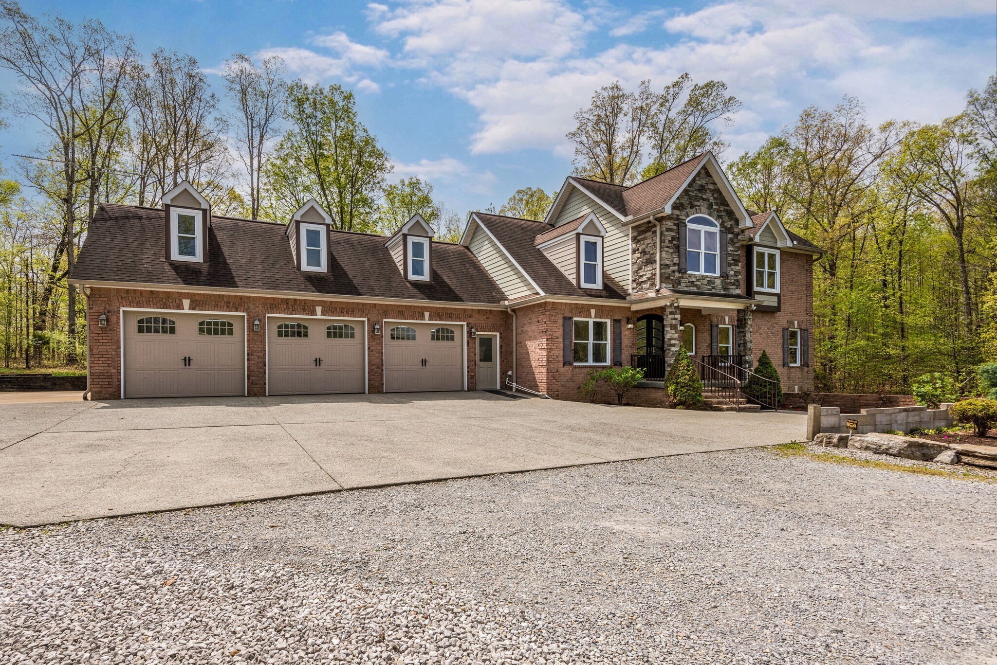 1288 2 Mile Road Burns, TN 37029 - Photo 50 of 70 a front view of a house with a yard