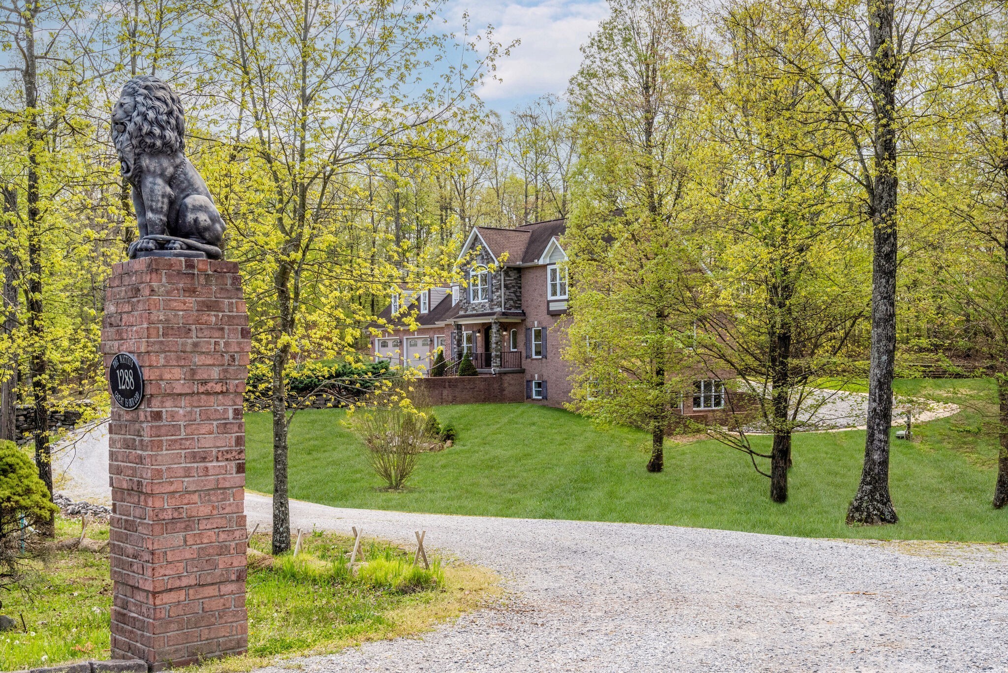 1288 2 Mile Road Burns, TN 37029 - Photo 66 of 70 a view of a garden with plants and large trees