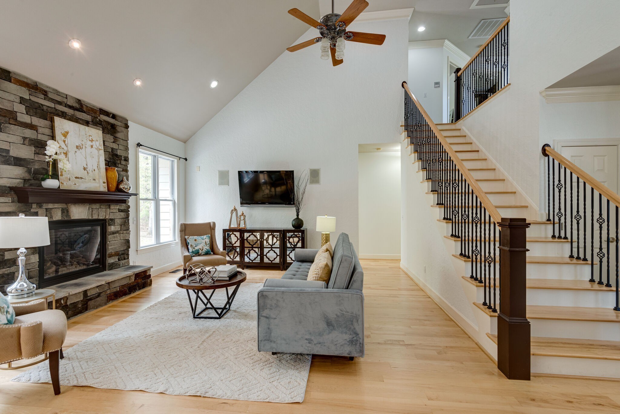 1288 2 Mile Road Burns, TN 37029 - Photo 8 of 70 a living room with furniture and a fireplace
