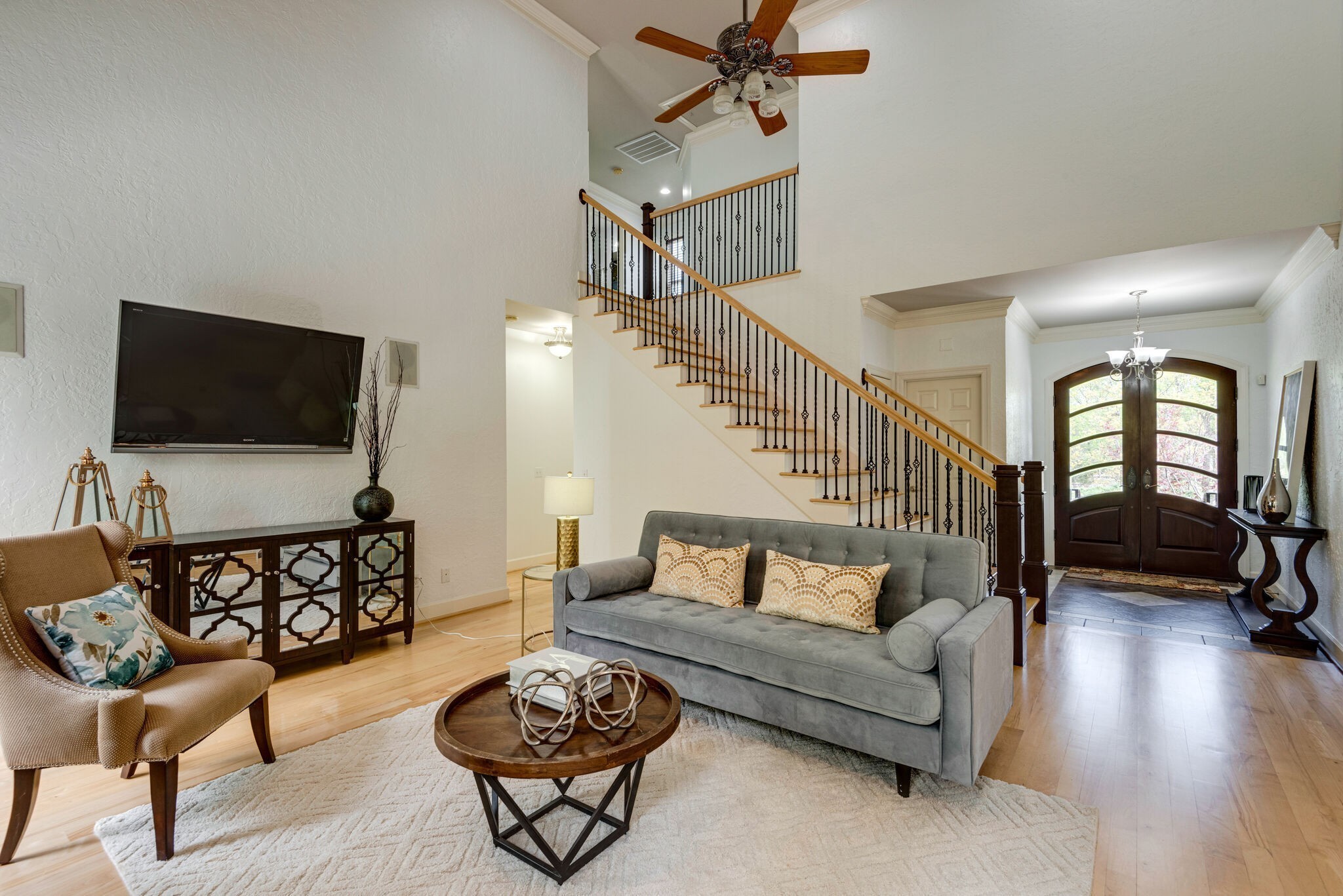 1288 2 Mile Road Burns, TN 37029 - Photo 9 of 70 a living room with furniture and a flat screen tv