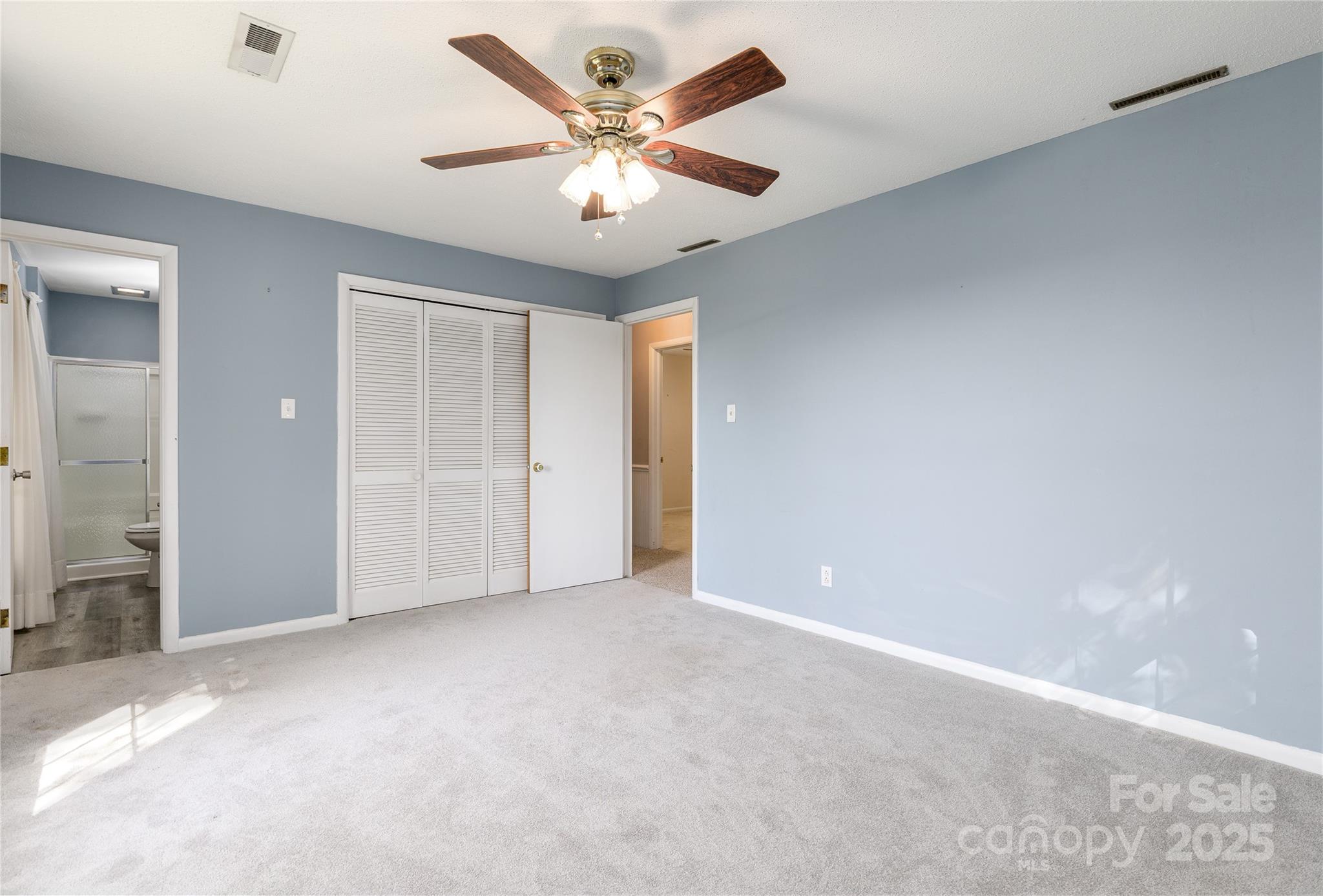 466 Shiloh Church Road Hickory, NC 28601 - Photo 14 of 45 an empty room with closet and a ceiling fan