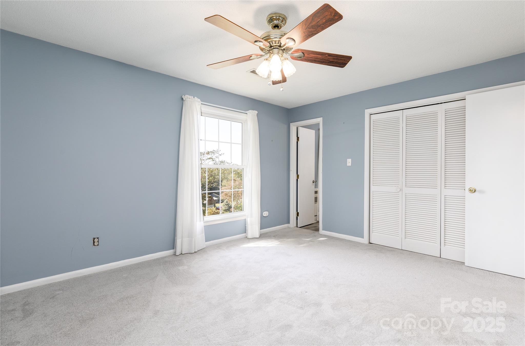466 Shiloh Church Road Hickory, NC 28601 - Photo 15 of 45 an empty room with windows and fan