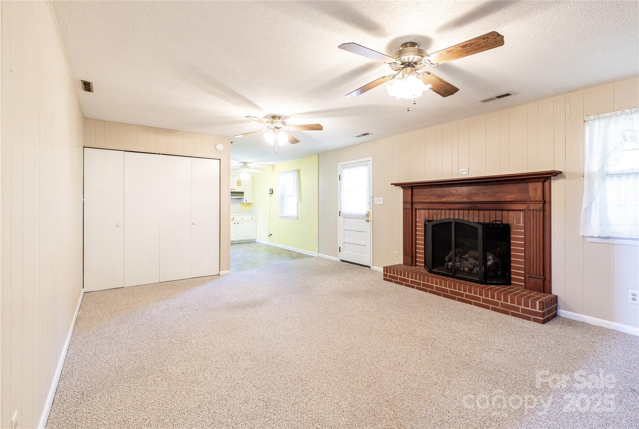 466 Shiloh Church Road Hickory, NC 28601 - Photo 20 of 45 a view of empty room with fan and fireplace