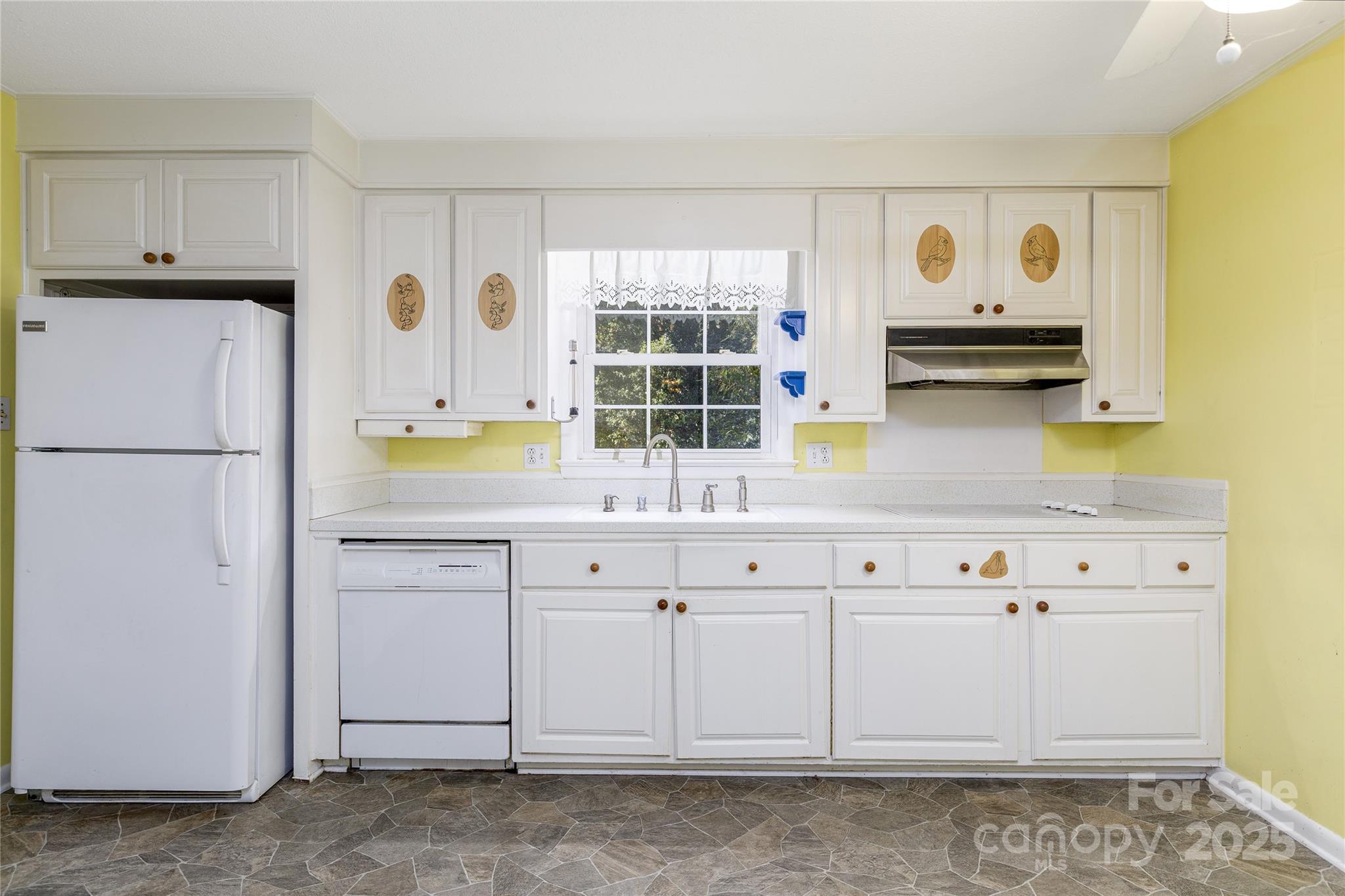 466 Shiloh Church Road Hickory, NC 28601 - Photo 25 of 45 a kitchen with granite countertop white cabinets and stainless steel appliances