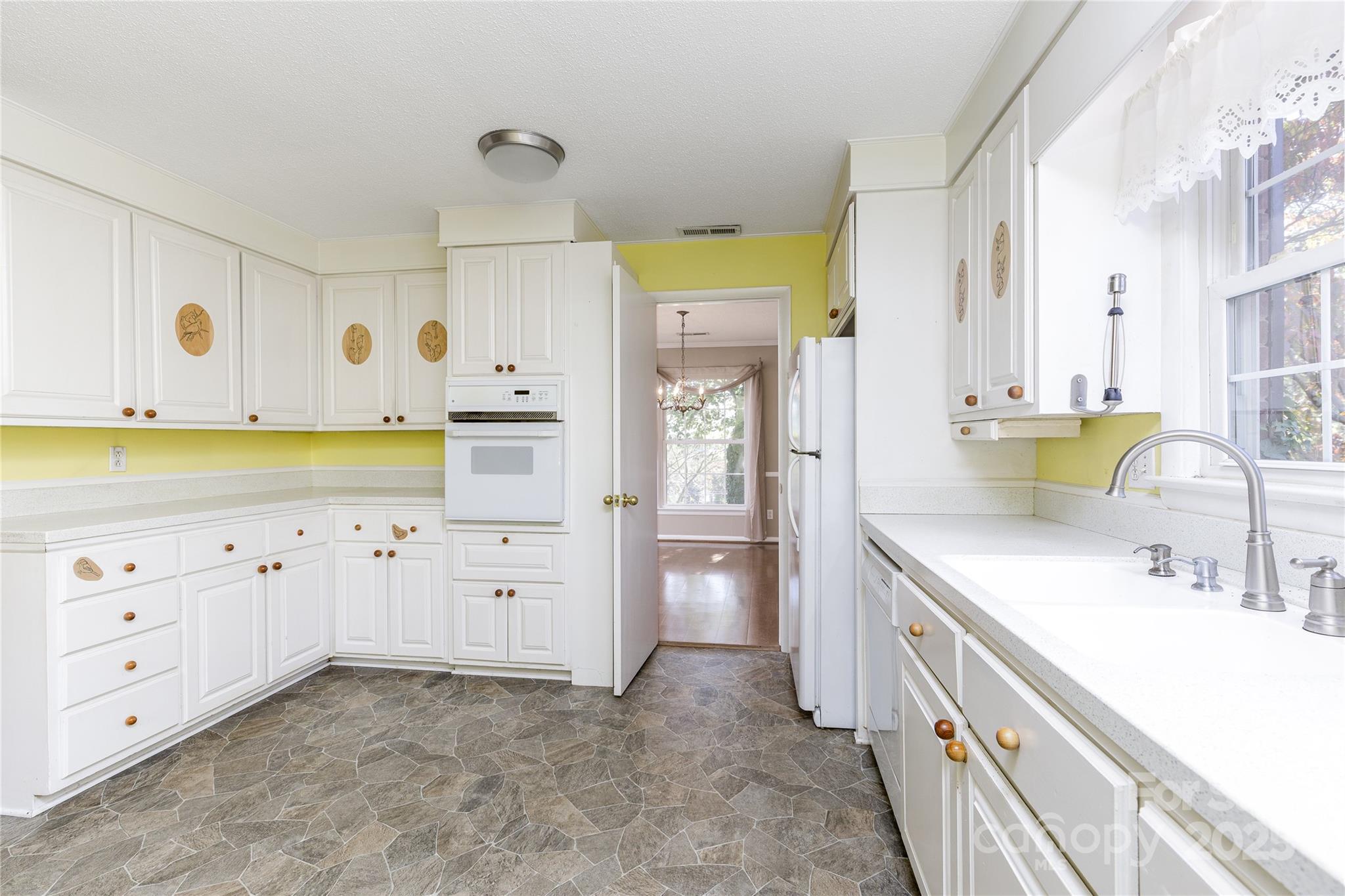 466 Shiloh Church Road Hickory, NC 28601 - Photo 28 of 45 a spacious bathroom with a granite countertop sink mirror and a bathtub