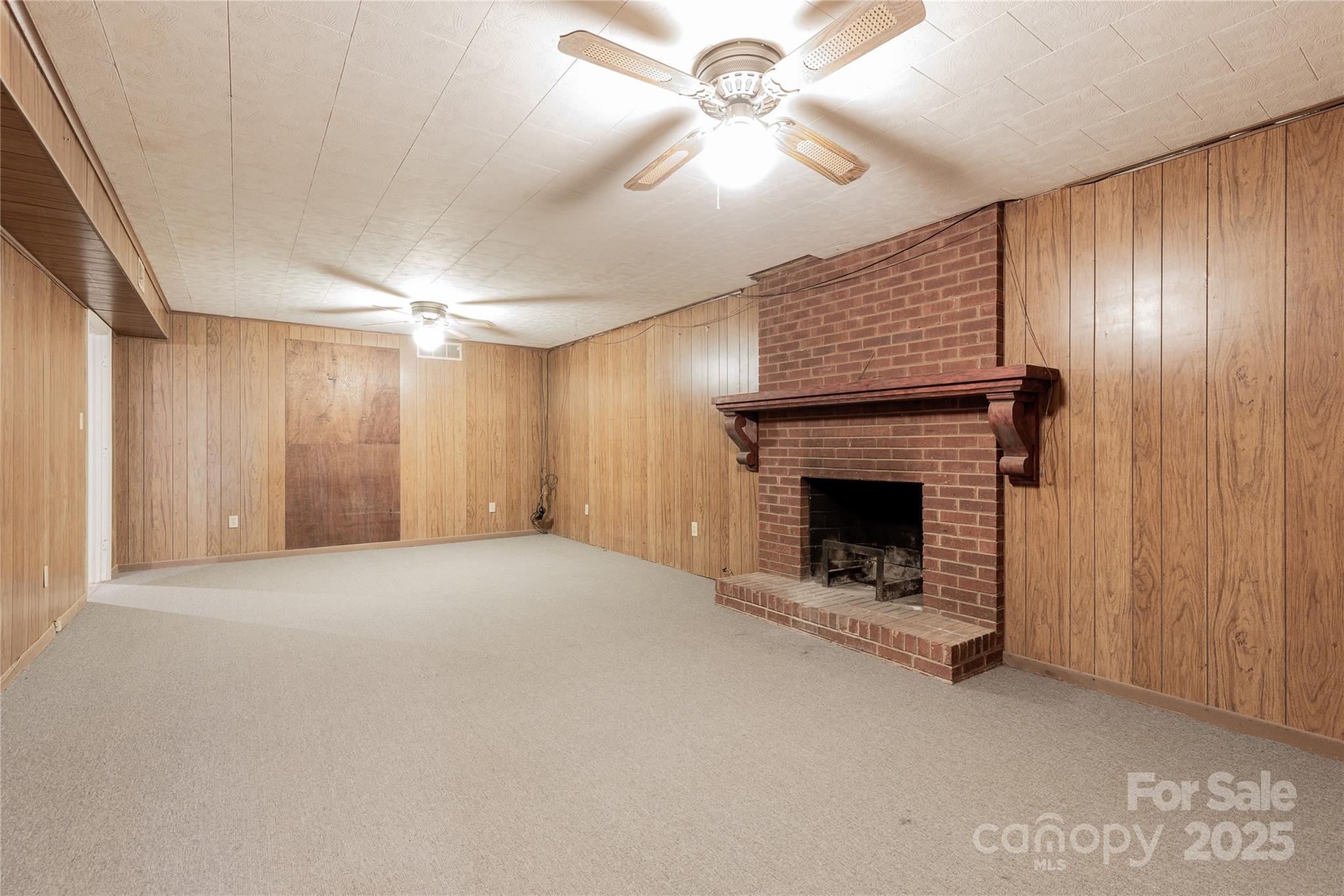 466 Shiloh Church Road Hickory, NC 28601 - Photo 35 of 45 a view of an empty room with a fireplace and a window