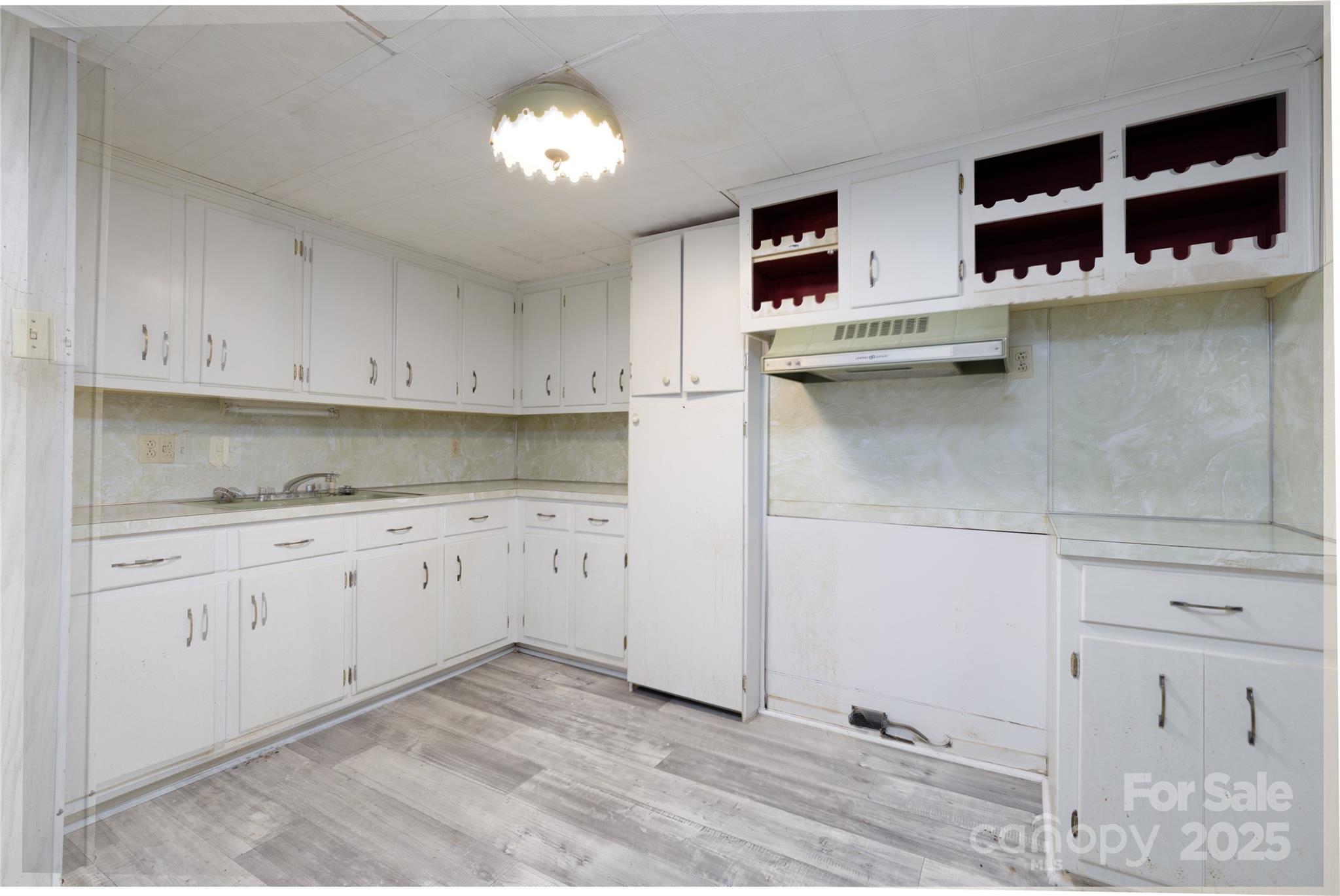 466 Shiloh Church Road Hickory, NC 28601 - Photo 39 of 45 a kitchen with cabinets and window