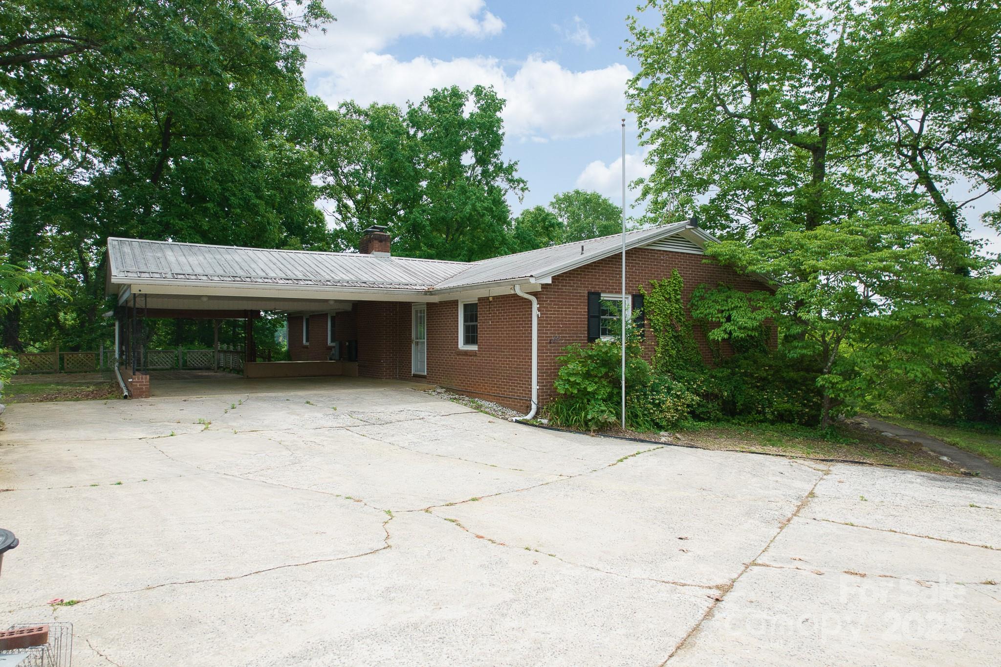 466 Shiloh Church Road Hickory, NC 28601 - Photo 41 of 45 a view of a house with a yard and potted plants