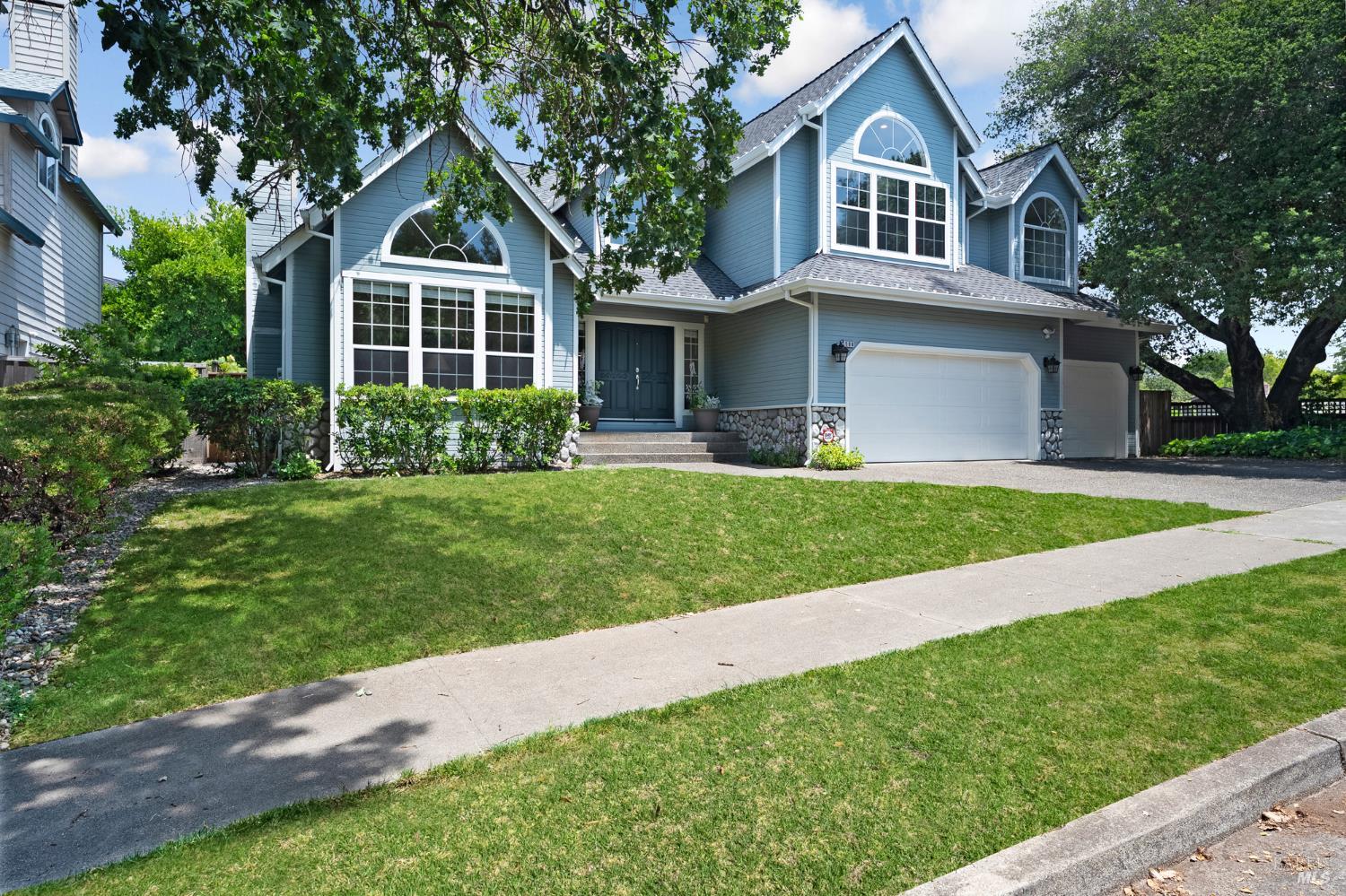 1508 Ronne Drive Santa Rosa, CA 95404 - Photo 1 of 55 a front view of a house with a yard and garage
