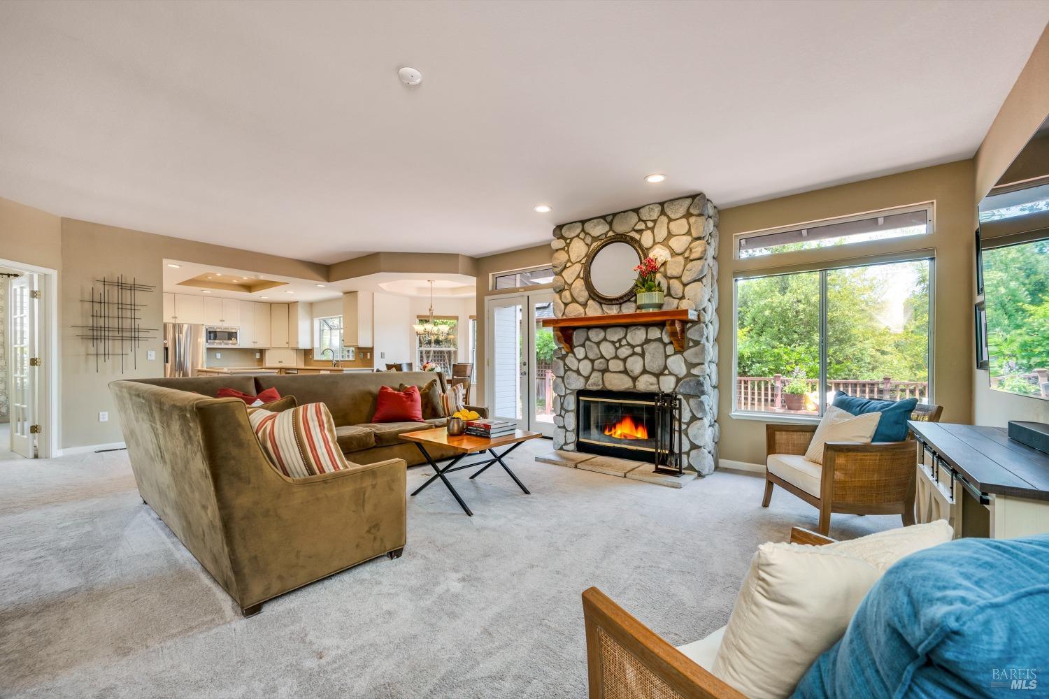 1508 Ronne Drive Santa Rosa, CA 95404 - Photo 15 of 55 a living room with furniture and a fireplace